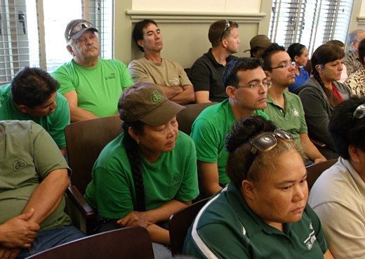 Pioneer employees who were bussed by DuPont County Council meeting for hearing on Bill 2491 to regulate GMO company pesticide use on Kauai Photo by Juan Wilson.